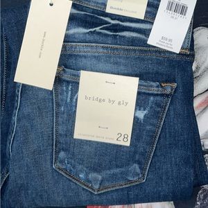 Brand new bridge by gly jeans. 28in with 31in inseam. Dark wash, mid rise.